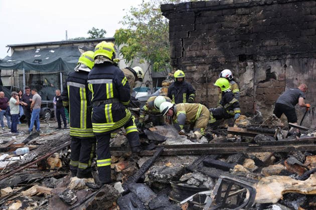 Rescuers clear the rubble at a two-storey residential building partially destroyed by a Russian drone attack, Odesa, Ukraine, July 22, 2026. In the morning, the Russian army struck the southern port city with attack drones, killing a man and injuring two people - an 82-year-old woman and a 54-year-old man. (Photo by Nina Liashonok Ukrinform) Russian army attacks Odesa with drones, killing 1 man  Copyright: xNinaxLiashonokx