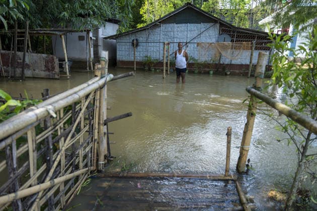 Flood in Indian Northeastern State Assam JORHAT, INDIA - JULY 22: A resident stands in the floodwaters outside his inundated home in a residential neighborhood, on July 22, 2026 in Jorhat, India. The flood situation in Assam remained critical, with more than 630,000 people affected across 21 districts. The state’s death toll has risen to 12. David Talukdar Anadolu Jorhat India. Editorial use only. Please get in touch for any other usage.  Copyright: x2026xAnadoluxDavidxTalukdarx