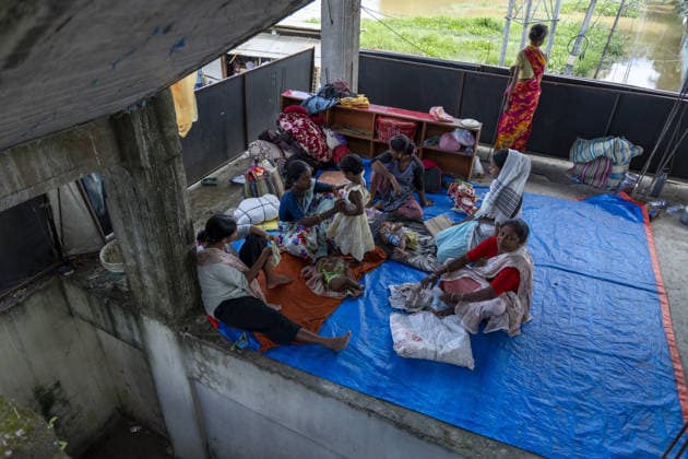 Flood in Indian Northeastern State Assam JORHAT, INDIA - JULY 22: Flood-affected residents take shelter in a building after being displaced by rising floodwaters, on July 22, 2026 in Jorhat, India. The flood situation in Assam remained critical, with more than 630,000 people affected across 21 districts. The state’s death toll has risen to 12. David Talukdar Anadolu Jorhat India. Editorial use only. Please get in touch for any other usage.  Copyright: x2026xAnadoluxDavidxTalukdarx