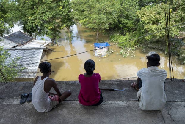 Flood in Indian Northeastern State Assam JORHAT, INDIA - JULY 22: Flood-affected residents take shelter in a building after being displaced by rising floodwaters, on July 22, 2026 in Jorhat, India. The flood situation in Assam remained critical, with more than 630,000 people affected across 21 districts. The state’s death toll has risen to 12. David Talukdar Anadolu Jorhat India. Editorial use only. Please get in touch for any other usage.  Copyright: x2026xAnadoluxDavidxTalukdarx