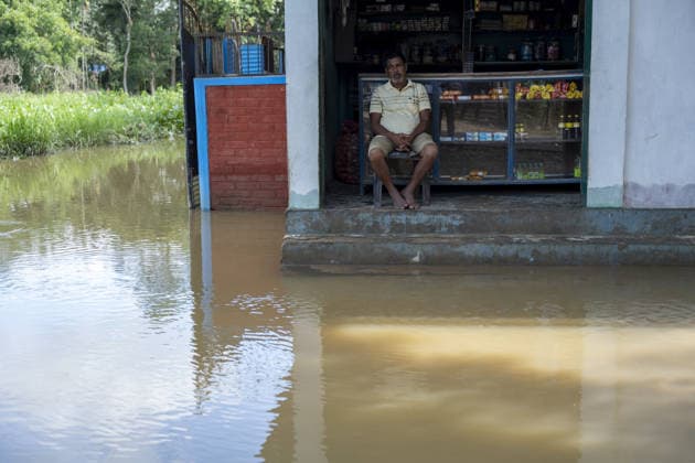 Flood in Indian Northeastern State Assam JORHAT, INDIA - JULY 22: A shopkeeper sits inside his grocery store surrounded by floodwaters in a flood-affected neighborhood, on July 22, 2026 in Jorhat, India. The flood situation in Assam remained critical, with more than 630,000 people affected across 21 districts. The state’s death toll has risen to 12. David Talukdar Anadolu Jorhat India. Editorial use only. Please get in touch for any other usage.  Copyright: x2026xAnadoluxDavidxTalukdarx