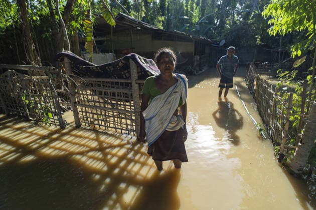 Flood in Indian Northeastern State Assam JORHAT, INDIA - JULY 22: Flood-affected residents stand outside their inundated home in a residential neighborhood, on July 22, 2026 in Jorhat, India. The flood situation in Assam remained critical, with more than 630,000 people affected across 21 districts. The state’s death toll has risen to 12. David Talukdar Anadolu Jorhat India. Editorial use only. Please get in touch for any other usage.  Copyright: x2026xAnadoluxDavidxTalukdarx