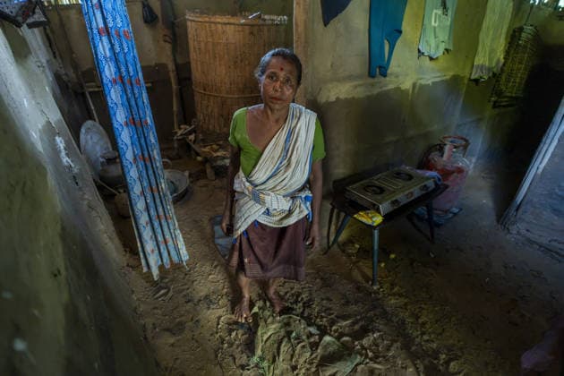 Flood in Indian Northeastern State Assam JORHAT, INDIA - JULY 22: A flood-affected resident stands inside her mud-covered home after floodwaters receded in a residential neighborhood, on July 22, 2026 in Jorhat, India. The flood situation in Assam remained critical, with more than 630,000 people affected across 21 districts. The state’s death toll has risen to 12. David Talukdar Anadolu Jorhat India. Editorial use only. Please get in touch for any other usage.  Copyright: x2026xAnadoluxDavidxTalukdarx