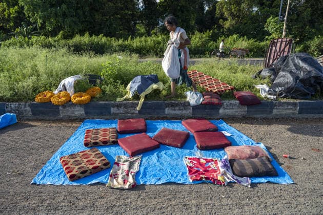 Flood in Indian Northeastern State Assam JORHAT, INDIA - JULY 22: A flood-affected resident dries water-soaked cushions, bedding and household belongings beside a roadside, on July 22, 2026 in Jorhat, India. The flood situation in Assam remained critical, with more than 630,000 people affected across 21 districts. The state’s death toll has risen to 12. David Talukdar Anadolu Jorhat India. Editorial use only. Please get in touch for any other usage.  Copyright: x2026xAnadoluxDavidxTalukdarx