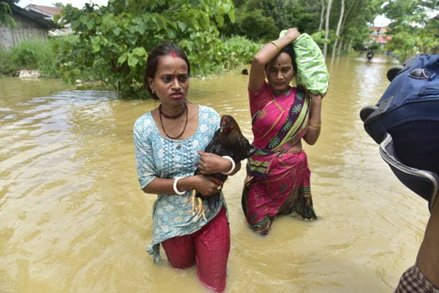 Heavy rainfall triggers severe flooding in Assam, India SIVSAGAR, INDIA - JULY 23: Indian women walk through flooded streets after heavy rainfall affects areas in Sivsagar district, Assam, India on July 23, 2026. Continuous heavy rainfall over the past few days has triggered severe flooding across several parts of Sivsagar district in Assam, leaving thousands of residents affected and disrupting normal life. Hafiz Ahmed Anadolu Sivsagar India. Editorial use only. Please get in touch for any other usage.  Copyright: x2026xAnadoluxHafizxAhmedx