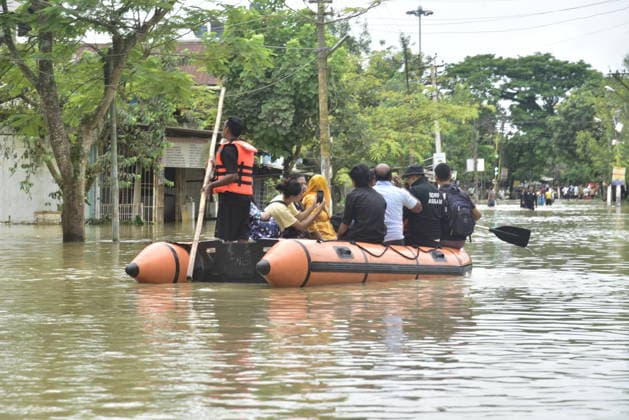 Heavy rainfall triggers severe flooding in Assam, India SIVSAGAR, INDIA - JULY 23: People use inflatable boats for transport after heavy rainfall affects areas in Sivsagar district, Assam, India on July 23, 2026. Continuous heavy rainfall over the past few days has triggered severe flooding across several parts of Sivsagar district in Assam, leaving thousands of residents affected and disrupting normal life. Hafiz Ahmed Anadolu Sivsagar India. Editorial use only. Please get in touch for any other usage.  Copyright: x2026xAnadoluxHafizxAhmedx