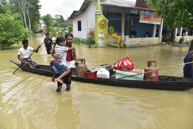 Heavy rainfall triggers severe flooding in Assam, India SIVSAGAR, INDIA - JULY 23: People walk through flooded streets after heavy rainfall affects areas in Sivsagar district, Assam, India on July 23, 2026. Continuous heavy rainfall over the past few days has triggered severe flooding across several parts of Sivsagar district in Assam, leaving thousands of residents affected and disrupting normal life. Hafiz Ahmed Anadolu Sivsagar India. Editorial use only. Please get in touch for any other usage.  Copyright: x2026xAnadoluxHafizxAhmedx