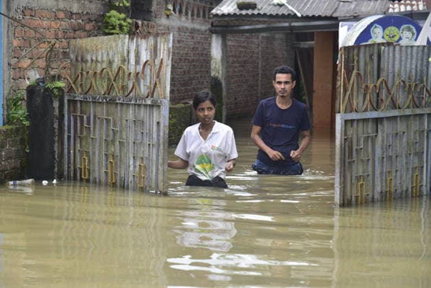 Heavy rainfall triggers severe flooding in Assam, India SIVSAGAR, INDIA - JULY 23: People walk through flooded streets after heavy rainfall affects areas in Sivsagar district, Assam, India on July 23, 2026. Continuous heavy rainfall over the past few days has triggered severe flooding across several parts of Sivsagar district in Assam, leaving thousands of residents affected and disrupting normal life. Hafiz Ahmed Anadolu Sivsagar India. Editorial use only. Please get in touch for any other usage.  Copyright: x2026xAnadoluxHafizxAhmedx