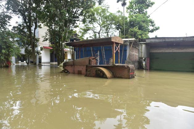 Heavy rainfall triggers severe flooding in Assam, India SIVSAGAR, INDIA - JULY 23: A vehicle submerged in floodwater is seen after heavy rainfall affects areas in Sivsagar district, Assam, India on July 23, 2026. Continuous heavy rainfall over the past few days has triggered severe flooding across several parts of Sivsagar district in Assam, leaving thousands of residents affected and disrupting normal life. Hafiz Ahmed Anadolu Sivsagar India. Editorial use only. Please get in touch for any other usage.  Copyright: x2026xAnadoluxHafizxAhmedx