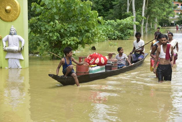 Heavy rainfall triggers severe flooding in Assam, India SIVSAGAR, INDIA - JULY 23: People walk through flooded streets after heavy rainfall affects areas in Sivsagar district, Assam, India on July 23, 2026. Continuous heavy rainfall over the past few days has triggered severe flooding across several parts of Sivsagar district in Assam, leaving thousands of residents affected and disrupting normal life. Hafiz Ahmed Anadolu Sivsagar India. Editorial use only. Please get in touch for any other usage.  Copyright: x2026xAnadoluxHafizxAhmedx