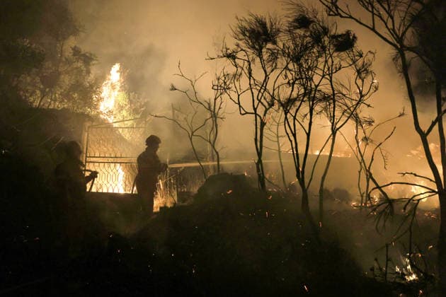 Wildfire threatens communities near Palermo in Sicily as firefighting efforts continue PALERMO, ITALY - JULY 23: Firefighters and civil protection teams battle a wildfire in the Casaboli Forest near Palermo as strong winds push the blaze toward the towns of Monreale, Pioppo and Sagana, while residents are evacuated from threatened homes, in Palermo, Sicily, Italy on July 23, 2026. The wildfire, which started the previous day, spread overnight, prompting emergency crews to work continuously to contain the flames and protect nearby communities. Alberto Lo Bianco Anadolu Palermo Italy. Editorial use only. Please get in touch for any other usage.  Copyright: x2026xAnadoluxAlbertoxLoxBiancox