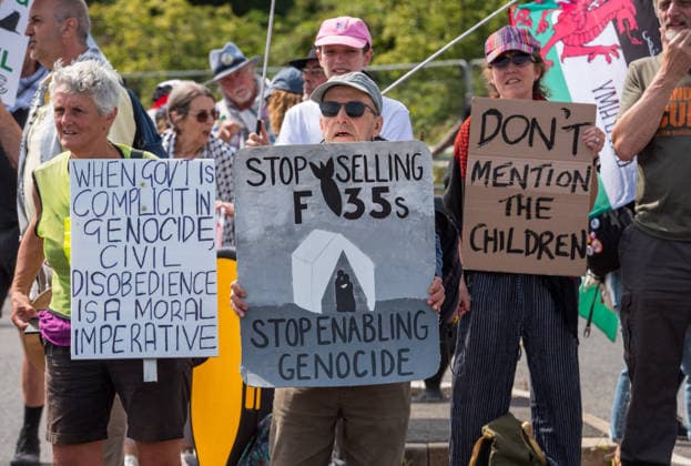 July 23, 2026, Bristol, Bristol, UK: Bristol, UK. A national protest calling for a full arms embargo on Israel takes place at the Israeli owned Elbit Systems production site in Filton. The protest is called by the Palestine Solidarity Campaign who say that Elbit Systems produces weapons and military technology used by Israel for genocide in the Gaza Strip, and military operations in the West Bank. PSC say the British government facilitates the export of weapons and military technology to Israel despite knowing it is to commit genocide. Bristol UK  - ZUMAl94_ 20260723_zaf_l94_016 Copyright: xSimonxChapmanx