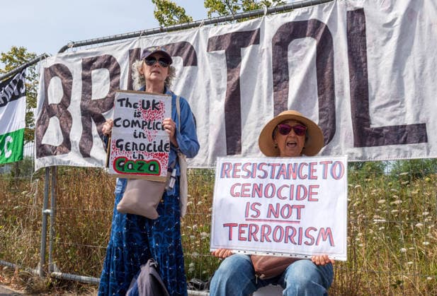 July 23, 2026, Bristol, Bristol, UK: Bristol, UK. A national protest calling for a full arms embargo on Israel takes place at the Israeli owned Elbit Systems production site in Filton. The protest is called by the Palestine Solidarity Campaign who say that Elbit Systems produces weapons and military technology used by Israel for genocide in the Gaza Strip, and military operations in the West Bank. PSC say the British government facilitates the export of weapons and military technology to Israel despite knowing it is to commit genocide. Bristol UK  - ZUMAl94_ 20260723_zaf_l94_021 Copyright: xSimonxChapmanx