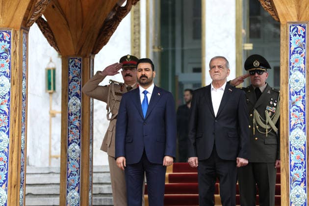Iraqi Prime Minister Ali al-Zaidi in Iran TEHRAN, IRAN - JULY 23: RESTRICTIONS: NO Access Israel Media Persian Language TV Stations Outside Iran Strictly No Access BBC Persian VOA Persian Manoto TV Iran International TV (----EDITORIAL USE ONLY MANDATORY CREDIT - IRANIAN PRESIDENCY HANDOUT - NO MARKETING NO ADVERTISING CAMPAIGNS - DISTRIBUTED AS A SERVICE TO CLIENTS----) Iraqi Prime Minister Ali al-Zaidi is welcomed by Iranian President Masoud Pezeshkian with official ceremony in Tehran, Iran on July 23, 2026. Iranian Presidency Handout Anadolu Tehran Iran. Editorial use only. Please get in touch for any other usage.  Copyright: x2026xAnadoluxIranianxPresidencyx xHandoutx