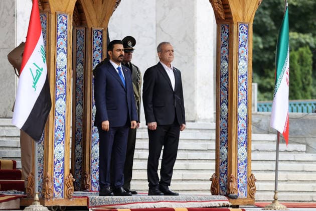 Iraqi Prime Minister Ali al-Zaidi in Iran TEHRAN, IRAN - JULY 23: RESTRICTIONS: NO Access Israel Media Persian Language TV Stations Outside Iran Strictly No Access BBC Persian VOA Persian Manoto TV Iran International TV (----EDITORIAL USE ONLY MANDATORY CREDIT - IRANIAN PRESIDENCY HANDOUT - NO MARKETING NO ADVERTISING CAMPAIGNS - DISTRIBUTED AS A SERVICE TO CLIENTS----) Iraqi Prime Minister Ali al-Zaidi is welcomed by Iranian President Masoud Pezeshkian with official ceremony in Tehran, Iran on July 23, 2026. Iranian Presidency Handout Anadolu Tehran Iran. Editorial use only. Please get in touch for any other usage.  Copyright: x2026xAnadoluxIranianxPresidencyx xHandoutx