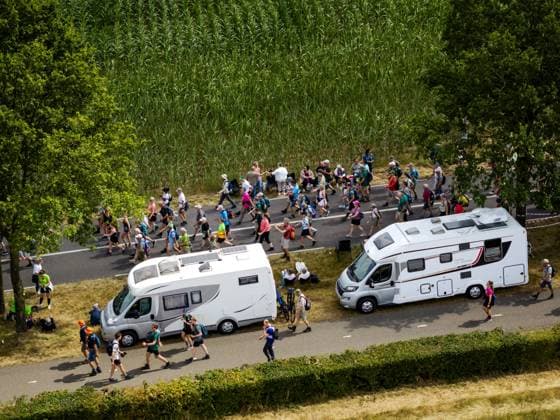 GROESBEEK - Drone photo of walkers braving the Zevenheuvelenweg on the third day of the Nijmegen Four Days Marches. Green Thursday took the walkers to the Seven Hills and past green villages such as Mook and Milsbeek. ROBIN VAN LONKHUIJSEN ANP netherlands out - belgium out  Copyright: xx x564126270x originalFilename: 564126270.jpg