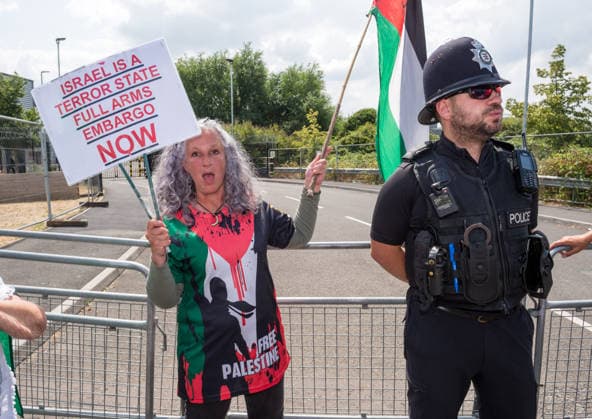 July 23, 2026, Bristol, Bristol, UK: Bristol, UK. A national protest calling for a full arms embargo on Israel takes place at the Israeli owned Elbit Systems production site in Filton. The protest is called by the Palestine Solidarity Campaign who say that Elbit Systems produces weapons and military technology used by Israel for genocide in the Gaza Strip, and military operations in the West Bank. PSC say the British government facilitates the export of weapons and military technology to Israel despite knowing it is to commit genocide. Bristol UK  - ZUMAl94_ 20260723_zaf_l94_044 Copyright: xSimonxChapmanx