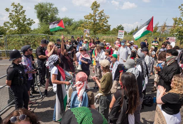 July 23, 2026, Bristol, Bristol, UK: Bristol, UK. A national protest calling for a full arms embargo on Israel takes place at the Israeli owned Elbit Systems production site in Filton. The protest is called by the Palestine Solidarity Campaign who say that Elbit Systems produces weapons and military technology used by Israel for genocide in the Gaza Strip, and military operations in the West Bank. PSC say the British government facilitates the export of weapons and military technology to Israel despite knowing it is to commit genocide. Bristol UK  - ZUMAl94_ 20260723_zaf_l94_049 Copyright: xSimonxChapmanx