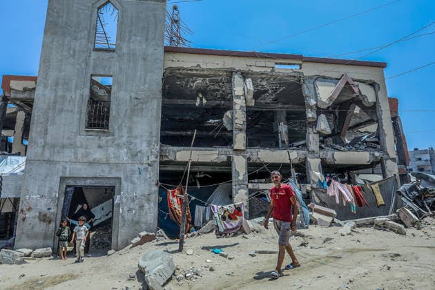 Life in the shadow of destruction in Khan Yunis KHAN YUNIS, GAZA, PALESTINE - JULY 23: Displaced Palestinian families, uprooted by ongoing intensive Israeli attacks across the Gaza Strip, take shelter in the severely damaged Al-Furqan Mosque in Khan Yunis, Gaza, Palestine on July 23, 2026. Deprived of basic necessities, civilians living in the damaged building are struggling with poor hygienic conditions and health issues caused by rodents and pests. Abed Rahim Khatib Anadolu Khan Yunis Gaza. Editorial use only. Please get in touch for any other usage.  Copyright: x2026xAnadoluxAbedxRahimxKhatibx