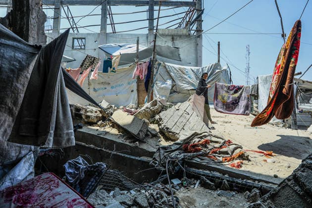 Life in the shadow of destruction in Khan Yunis KHAN YUNIS, GAZA, PALESTINE - JULY 23: Displaced Palestinian families, uprooted by ongoing intensive Israeli attacks across the Gaza Strip, take shelter in the severely damaged Al-Furqan Mosque in Khan Yunis, Gaza, Palestine on July 23, 2026. Deprived of basic necessities, civilians living in the damaged building are struggling with poor hygienic conditions and health issues caused by rodents and pests. Abed Rahim Khatib Anadolu Khan Yunis Gaza. Editorial use only. Please get in touch for any other usage.  Copyright: x2026xAnadoluxAbedxRahimxKhatibx