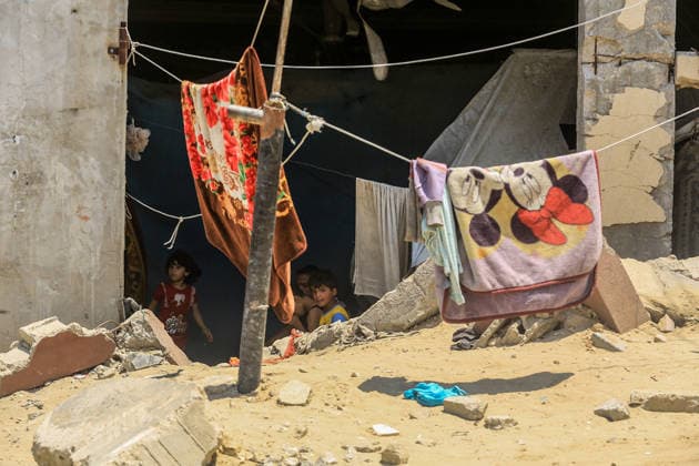 Life in the shadow of destruction in Khan Yunis KHAN YUNIS, GAZA, PALESTINE - JULY 23: Displaced Palestinian families, uprooted by ongoing intensive Israeli attacks across the Gaza Strip, take shelter in the severely damaged Al-Furqan Mosque in Khan Yunis, Gaza, Palestine on July 23, 2026. Deprived of basic necessities, civilians living in the damaged building are struggling with poor hygienic conditions and health issues caused by rodents and pests. Abed Rahim Khatib Anadolu Khan Yunis Gaza. Editorial use only. Please get in touch for any other usage.  Copyright: x2026xAnadoluxAbedxRahimxKhatibx