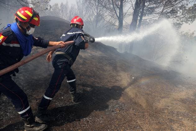 Fires In The City Of Bordj Okhriss, Bouira, Algeria Civil protection personnel work to extinguish fires in the town of Bordj Okhriss, in the Bouira mountains of Algeria. According to the civil protection report, the fires are under control. Bouira Algeria  Copyright: xAPPx originalFilename: app-notitle260723_npoE9.jpg