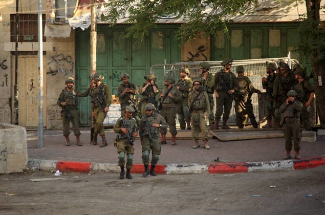 Israeli security forces deploy in Hebron city center Members of the Israeli security forces deploy in the Bab al-Zawiya area in the center of the West Bank city of Hebron on July 23, 2026, while closing streets and restricting the movement of Palestinians to secure the entry of Israeli settlers into the area, according to witnesses. Residents said the measures disrupted daily movement and forced a number of shops to close during the settlers visit. Photo by Mamoun Wazwaz apaimages Hebron West Bank Palestinian Territory 230726_Hebron_MW_00(17) Copyright: xapaimagesxMamounxWazwazx xapaimagesx