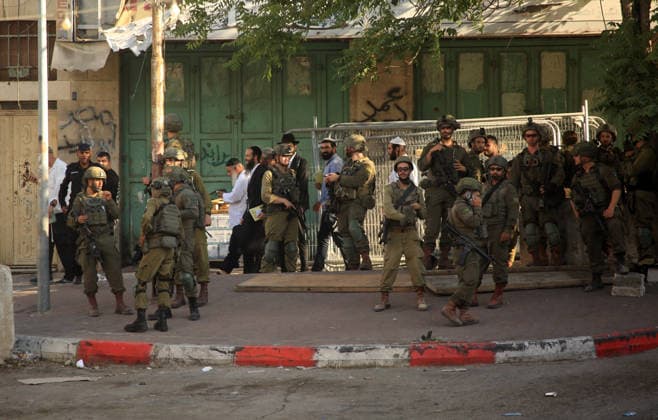 Israeli security forces deploy in Hebron city center Members of the Israeli security forces deploy in the Bab al-Zawiya area in the center of the West Bank city of Hebron on July 23, 2026, while closing streets and restricting the movement of Palestinians to secure the entry of Israeli settlers into the area, according to witnesses. Residents said the measures disrupted daily movement and forced a number of shops to close during the settlers visit. Photo by Mamoun Wazwaz apaimages Hebron West Bank Palestinian Territory 230726_Hebron_MW_00(22) Copyright: xapaimagesxMamounxWazwazx xapaimagesx