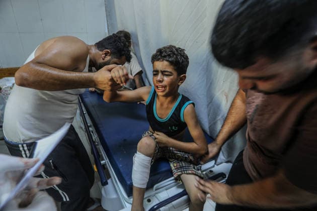 Israel continues its attacks on Gaza despite the ceasefire KHAN YUNIS, GAZA, PALESTINE - JULY 23: Injured Palestinians, including children, are brought to Nasser Hospital for medical treatment after the Israeli army s attack on tents housing displaced civilians despite the ceasefire in Khan Yunis, Gaza, Palestine on July 23, 2026. Abed Rahim Khatib Anadolu Khan Yunis Gaza. Editorial use only. Please get in touch for any other usage.  Copyright: x2026xAnadoluxAbedxRahimxKhatibx