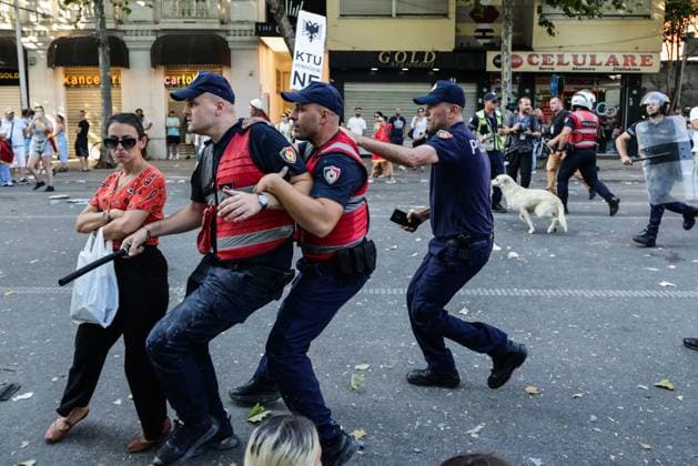 July 23, 2026, Tirana, Albania: TIRANA, ALBANIA Ã¢â‚¬ JULY 23, 2026: Demonstrators gathered outside the Albanian Parliament during the fifty-fourth consecutive day of anti-government protests in Tirana, Albania, on July 23, 2026. Protesters attempted to block lawmakers arriving for the parliamentary session, leading to confrontations with riot police. Officers deployed water cannons, pepper spray and physical force as clashes broke out outside the parliament building. Several demonstrators were detained, while both protesters and police officers sustained injuries during the unrest. The protest movement, which began in opposition to a proposed luxury tourism development project linked to Jared Kushner and other international investors, h - ZUMAq101 20260723_zna_q101_146 Copyright: xVlasovxSulajx