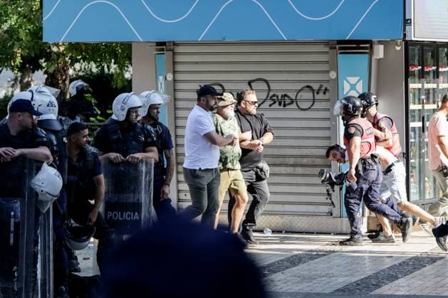 July 23, 2026, Tirana, Albania: TIRANA, ALBANIA Ã¢â‚¬ JULY 23, 2026: Demonstrators gathered outside the Albanian Parliament during the fifty-fourth consecutive day of anti-government protests in Tirana, Albania, on July 23, 2026. Protesters attempted to block lawmakers arriving for the parliamentary session, leading to confrontations with riot police. Officers deployed water cannons, pepper spray and physical force as clashes broke out outside the parliament building. Several demonstrators were detained, while both protesters and police officers sustained injuries during the unrest. The protest movement, which began in opposition to a proposed luxury tourism development project linked to Jared Kushner and other international investors, h - ZUMAq101 20260723_zna_q101_153 Copyright: xVlasovxSulajx