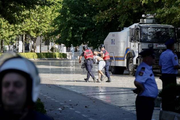July 23, 2026, Tirana, Albania: TIRANA, ALBANIA Ã¢â‚¬ JULY 23, 2026: Demonstrators gathered outside the Albanian Parliament during the fifty-fourth consecutive day of anti-government protests in Tirana, Albania, on July 23, 2026. Protesters attempted to block lawmakers arriving for the parliamentary session, leading to confrontations with riot police. Officers deployed water cannons, pepper spray and physical force as clashes broke out outside the parliament building. Several demonstrators were detained, while both protesters and police officers sustained injuries during the unrest. The protest movement, which began in opposition to a proposed luxury tourism development project linked to Jared Kushner and other international investors, h - ZUMAq101 20260723_zna_q101_154 Copyright: xVlasovxSulajx