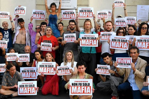 IPA86929670 - Milan, July 23, 2026: A civil society flash mob to demand truth and justice for the Via Palestro massacre. It Wasn’t Just the Mafia is the name of the event, through which more than 150 citizens and institutional representatives, along with 37 civil society organizations, will once again shine a spotlight on the all-too-many unresolved mysteries surrounding the massacre.  Copyright: xMaurizioxMaulex xMaurizioxMaulex 86929670