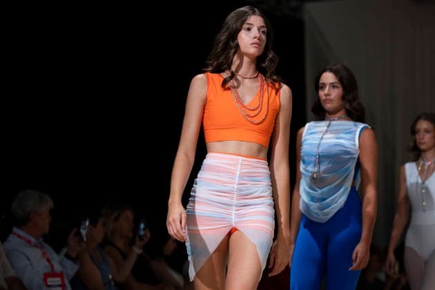 UNIENDO MODA - MOMAD Fashion Week de Madrid ,Spain - 23 Jul 2026 A model walks the runway wearing a design by UNIENDO MODA during the Momad Fashion Week de Madrid in IFEMA. Madrid Spain Copyright: xAtilanoxGarciax xSOPAxImagesx photo02971