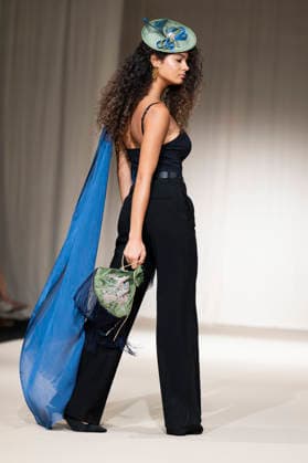 UNIENDO MODA - MOMAD Fashion Week de Madrid ,Spain - 23 Jul 2026 A model walks the runway wearing a design by UNIENDO MODA during the Momad Fashion Week de Madrid in IFEMA. Madrid Spain Copyright: xAtilanoxGarciax xSOPAxImagesx photo02975