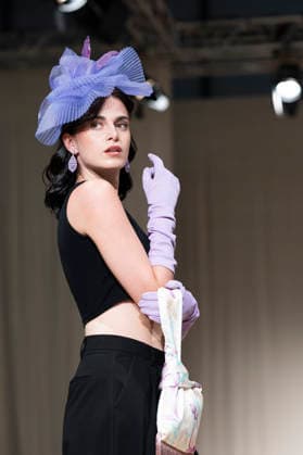 UNIENDO MODA - MOMAD Fashion Week de Madrid ,Spain - 23 Jul 2026 A model walks the runway wearing a design by UNIENDO MODA during the Momad Fashion Week de Madrid in IFEMA. Madrid Spain Copyright: xAtilanoxGarciax xSOPAxImagesx photo02981