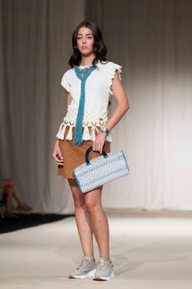 UNIENDO MODA - MOMAD Fashion Week de Madrid ,Spain - 23 Jul 2026 A model walks the runway wearing a design by UNIENDO MODA during the Momad Fashion Week de Madrid in IFEMA. Madrid Spain Copyright: xAtilanoxGarciax xSOPAxImagesx photo02987