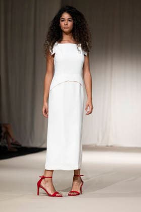 UNIENDO MODA - MOMAD Fashion Week de Madrid ,Spain - 23 Jul 2026 A model walks the runway wearing a design by UNIENDO MODA during the Momad Fashion Week de Madrid in IFEMA. Madrid Spain Copyright: xAtilanoxGarciax xSOPAxImagesx photo03001