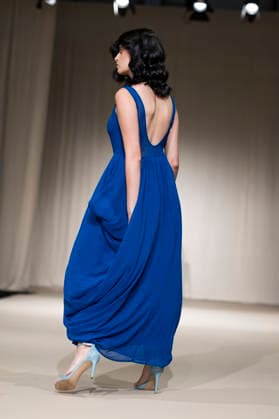 UNIENDO MODA - MOMAD Fashion Week de Madrid ,Spain - 23 Jul 2026 A model walks the runway wearing a design by UNIENDO MODA during the Momad Fashion Week de Madrid in IFEMA. Madrid Spain Copyright: xAtilanoxGarciax xSOPAxImagesx photo03006