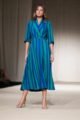 UNIENDO MODA - MOMAD Fashion Week de Madrid ,Spain - 23 Jul 2026 A model walks the runway wearing a design by UNIENDO MODA during the Momad Fashion Week de Madrid in IFEMA. Madrid Spain Copyright: xAtilanoxGarciax xSOPAxImagesx photo03007