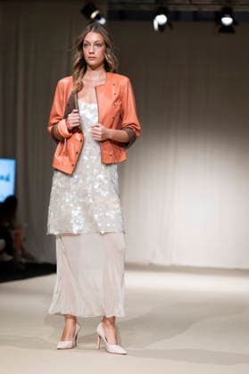 UNIENDO MODA - MOMAD Fashion Week de Madrid ,Spain - 23 Jul 2026 A model walks the runway wearing a design by UNIENDO MODA during the Momad Fashion Week de Madrid in IFEMA. Madrid Spain Copyright: xAtilanoxGarciax xSOPAxImagesx photo03016