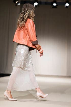 UNIENDO MODA - MOMAD Fashion Week de Madrid ,Spain - 23 Jul 2026 A model walks the runway wearing a design by UNIENDO MODA during the Momad Fashion Week de Madrid in IFEMA. Madrid Spain Copyright: xAtilanoxGarciax xSOPAxImagesx photo03017