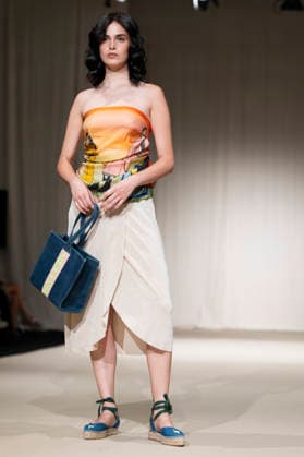 UNIENDO MODA - MOMAD Fashion Week de Madrid ,Spain - 23 Jul 2026 A model walks the runway wearing a design by UNIENDO MODA during the Momad Fashion Week de Madrid in IFEMA. Madrid Spain Copyright: xAtilanoxGarciax xSOPAxImagesx photo03018