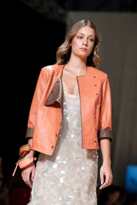 UNIENDO MODA - MOMAD Fashion Week de Madrid ,Spain - 23 Jul 2026 A model walks the runway wearing a design by UNIENDO MODA during the Momad Fashion Week de Madrid in IFEMA. Madrid Spain Copyright: xAtilanoxGarciax xSOPAxImagesx photo03021