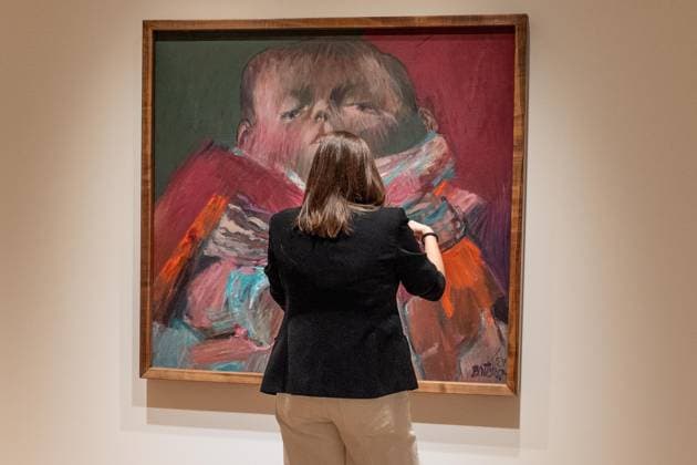 July 23, 2026, Bronx, New York, USA: A woman examines El Nino de Vallecas (After Velasquez) by Fernando Botero during press preview for exhibition and private sale of Botero in New York: Rarely-Seen Works from Botero s Most Defining Decade at The Breuer of Sotheby s in New York, NY on July 23, 2026 Bronx USA  - ZUMAr339 20260723_znp_r339_035 Copyright: xLevxRadinx