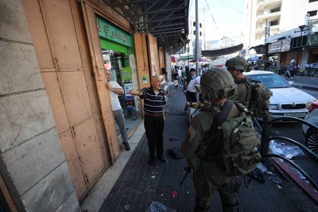 July 23, 2026, Hebron, Palestine, State of: HEBRON, WEST BANK Ã¢â‚¬ JULY 23, 2026: Israeli forces closed the central market and restricted the movement of Palestinians in the city of Hebron during a raid on the area to secure settlers access to the Tomb of the Patriarchs, where they performed Jewish prayers, on July 23, 2026. Hebron Palestine, State of - ZUMAq101 20260723_zna_q101_166 Copyright: xMosabxShawerx