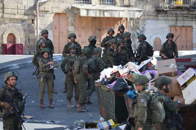July 23, 2026, Hebron, Palestine, State of: HEBRON, WEST BANK Ã¢â‚¬ JULY 23, 2026: Israeli forces closed the central market and restricted the movement of Palestinians in the city of Hebron during a raid on the area to secure settlers access to the Tomb of the Patriarchs, where they performed Jewish prayers, on July 23, 2026. Hebron Palestine, State of - ZUMAq101 20260723_zna_q101_174 Copyright: xMosabxShawerx