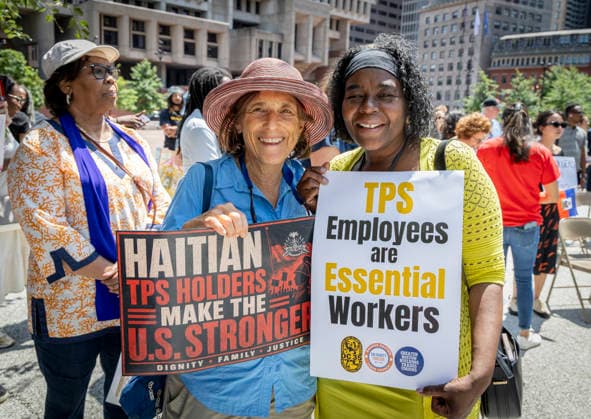 July 23, 2026. Boston, MA. People gathered in Boston City Hall Plaza to urge protection of Haitian Families. A coalition of advocacy organizations rallied to protect Haitian TPS and to stand for safety, stability, and the right for Haitian families to continue living, working, and contributing to our communities. The event was organized by a coalition of advocacy groups, including IFSI-USA, urging U.S. Senators to support Senate Bill 4814 to safeguard Haitian families and workers and demand work authorization rights for Haitian families. ProtectHaitianTPS SaveTPS TPSJustice StandWithHaiti HaitianCommunity BostonRally ImmigrantJustice immigrantrights Boston Massachusetts USA EDITORIAL USE ONLY Copyright: x x2026xMarilynxHumphriesx MARILYNxHUMPHRIESx mhphotos016599