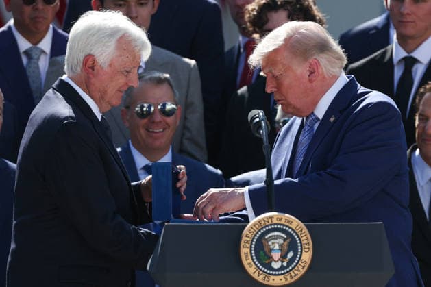 DC: Trump Hosts 2025 MLB World Series Champions LA Dodgers at White House Mark Walter gives a ring to President Donald Trump during an event with the 2025 MLB World Series Champions the Los Angeles Dodgers in the Rose Garden at the White House on July 23, 2026 in Washington, D.C. The Dodgers defeated the Toronto Blue Jays in Game 7 of the 2025 MLB World Series to claim back-to-back championship titles. (Photo by Samuel Corum Pool ABACAPRESS.COM) Washington DC United States  Copyright: xPool ABACAx