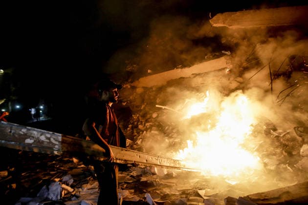 Israeli army continues attacks on Gaza Strip GAZA CITY, GAZA, PALESTINE - JULY 23: Search and rescue teams, firefighters, and medical crews are dispatched after an Israeli airstrike hit a building causing extensive damage and sparking a fire, in the Al-Jalaa neighborhood of Gaza City, Gaza Strip, Palestine, on July 23, 2026. Saeed M. M. T. Jaras Anadolu Gaza City Gaza. Editorial use only. Please get in touch for any other usage.  Copyright: x2026xAnadoluxSaeedxM.xM.xT.xJarasx